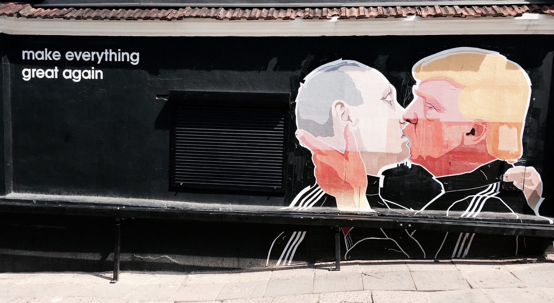 Donald Trump Make Everything Great Again Street art mural placed on the wall of a barbecue restaurant in the old town of Vilnius Lithuania done by the artists Dominykas Čečkauskas and Mindaugas Bonanu