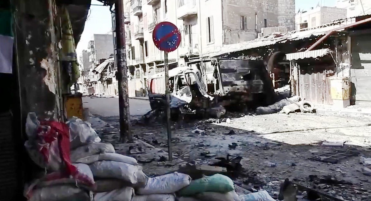 Bombed out vehicles AleppoScott Bobb Voice of America News