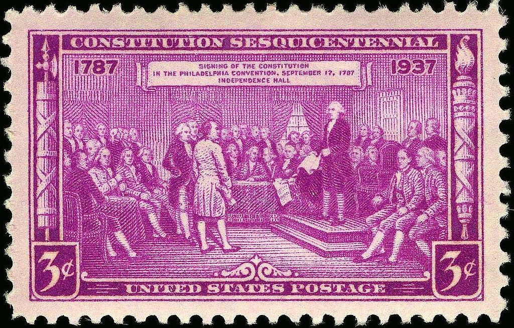 US Postage Stamp depicting delegates at the signing of the US Constitution photo Bureau of Engraving and Printing