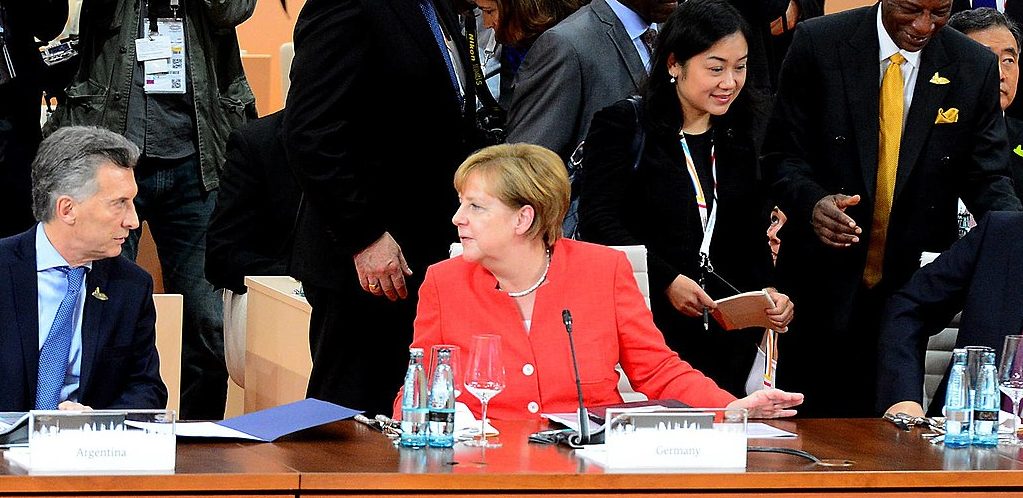 Mauricio Macri alongside Angela Merkel and Xi Jinping at the G20 2017 summit by Casa Rosada