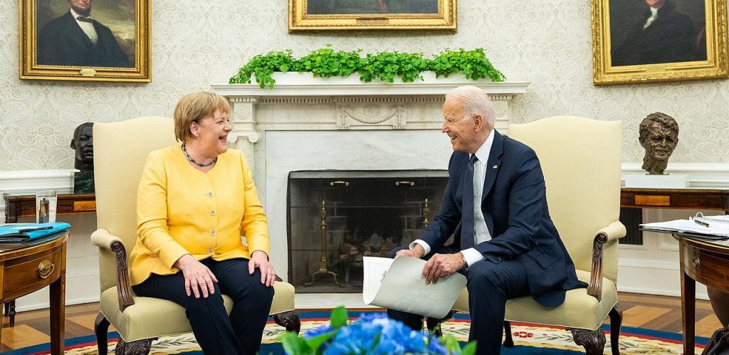 Joe Biden and Angela Merkel in the Oval Office by Office of the President of the United States