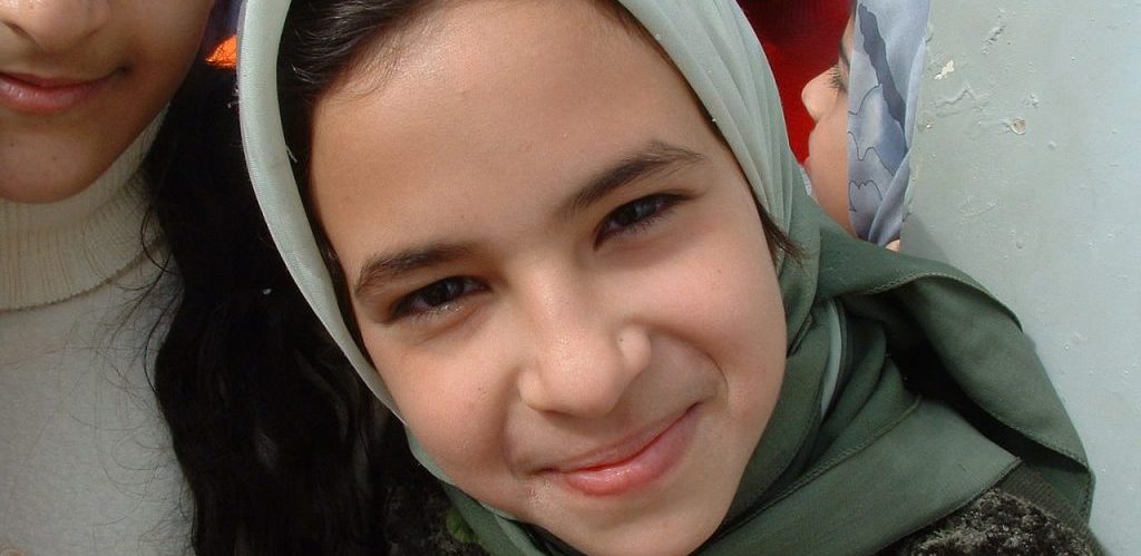 Iraqi Girl Smiles by Christiaan Briggs
