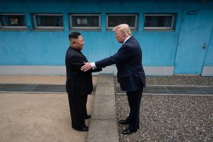 President Donald J. Trump shakes hands with Chairman of the Workers Party of Korea Kim Jong Un by The White House