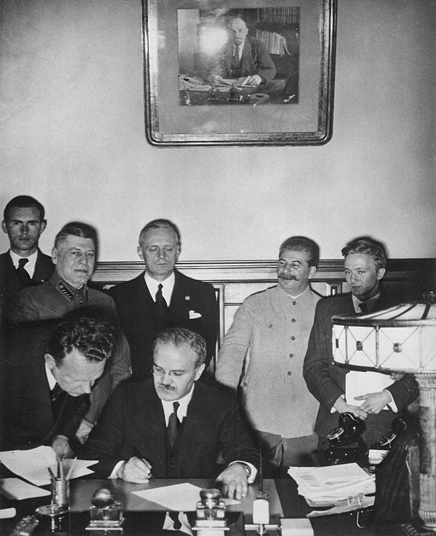 Soviet Foreign Minister Vyacheslav Molotov signs the German–Soviet Treaty of Friendship in Moscow, September 28, 1939, National Archives and Records Administration